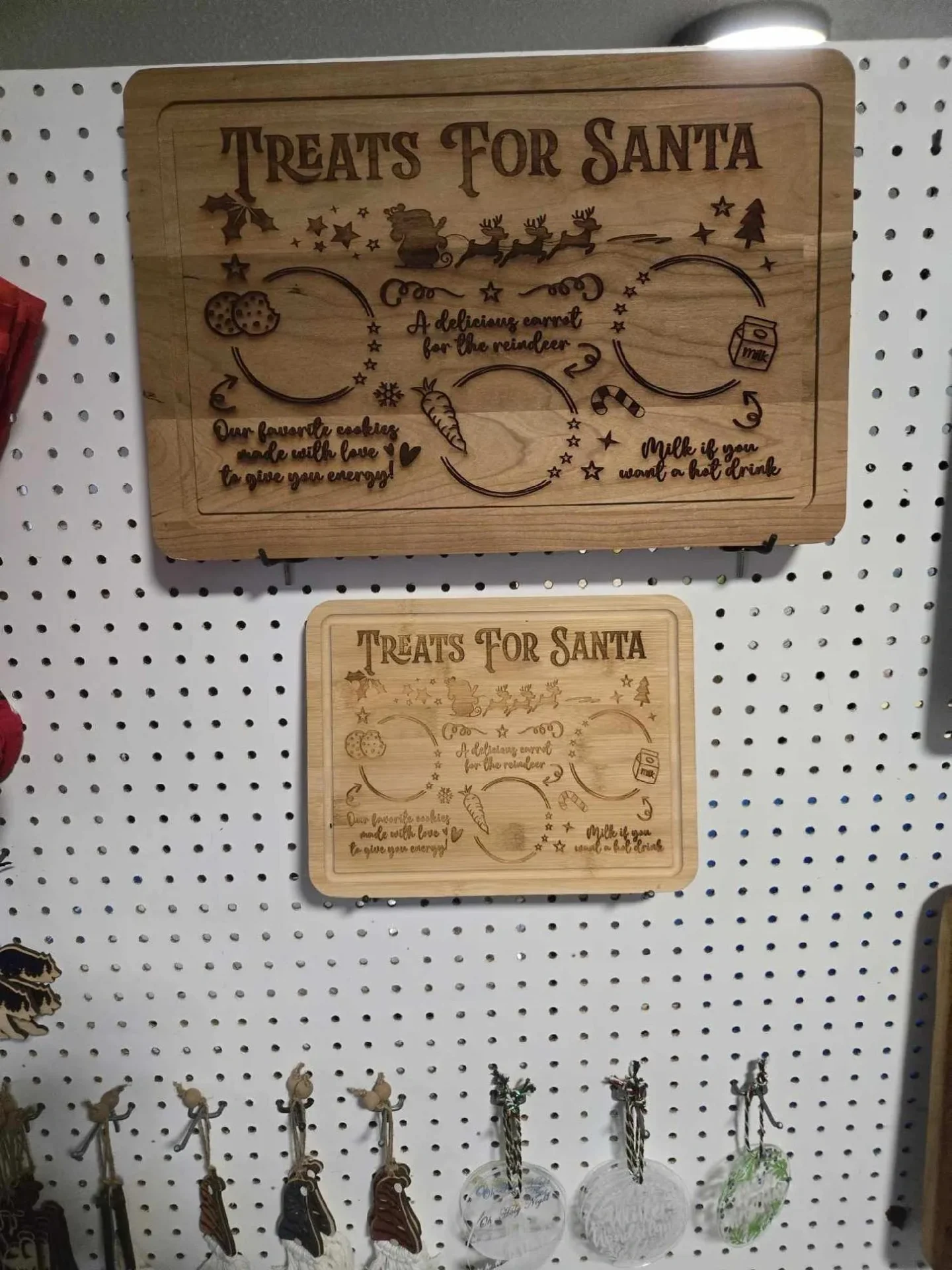 Wooden "Treats for Santa" boards displayed.
